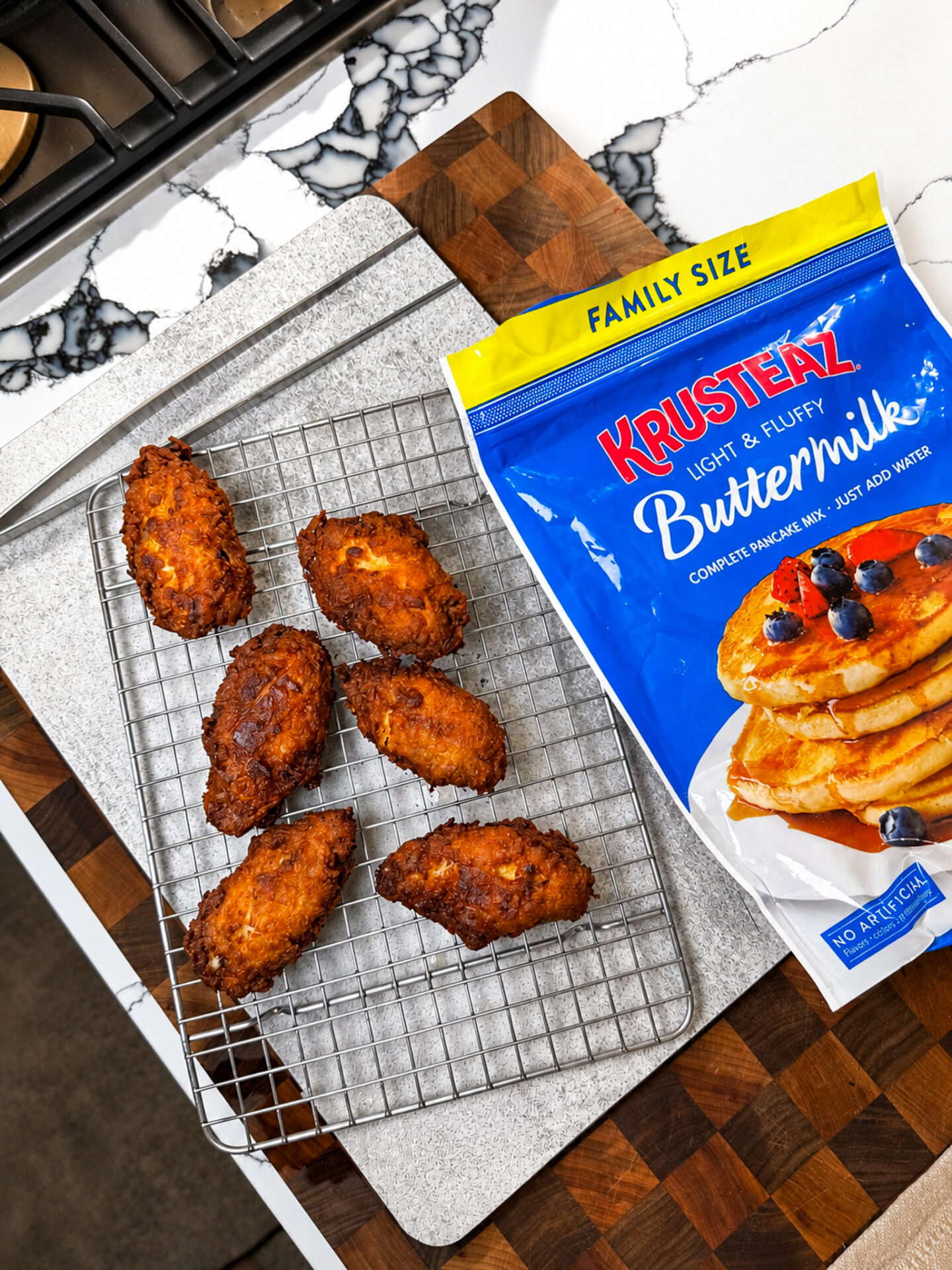 Crispy Pancake Battered Fried Chicken wings coated in seasoned pancake mix and fried until golden brown and crunchy.